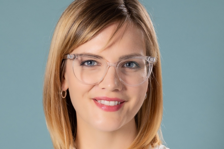 headshot of Casey