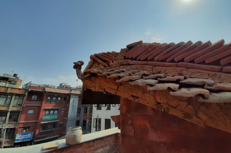 Eave with deteriorating mud cladding