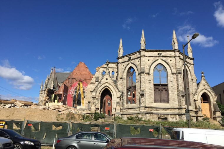 Partially destroyed church with fenced off region