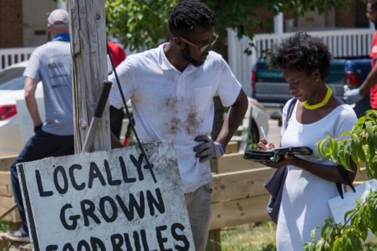 Tommy Joshua & Samira Bailey of the Philadelphia Tribune on Phase 01 Build Day. Photo credit: Habitat for Humanity