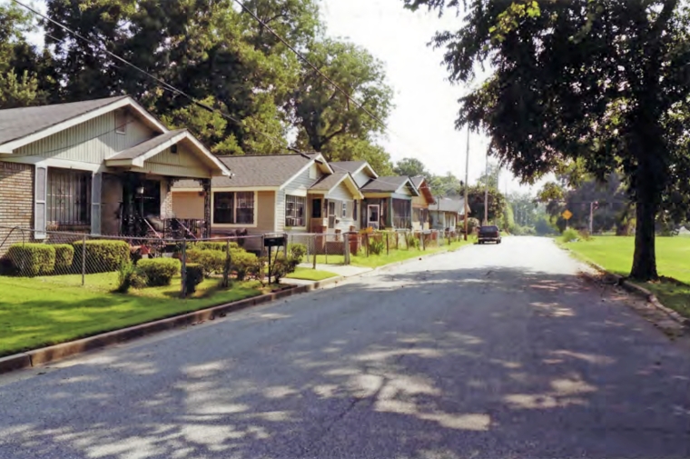 Rural block with ranch homes seen during the day