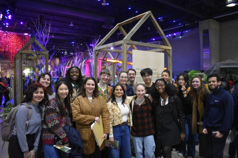 Large group poses at an indoor event