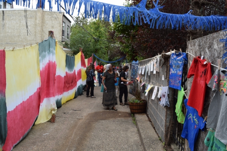 Community artwork decorating alley walls
