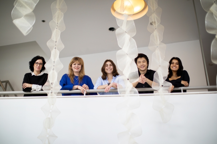 Laia Mogas-Soldevila and students on balcony overlooking hanging strips 