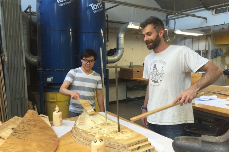 Jono Sanders and Philip Chang assemble elements of the sculpture, which will be on display during September 2016.