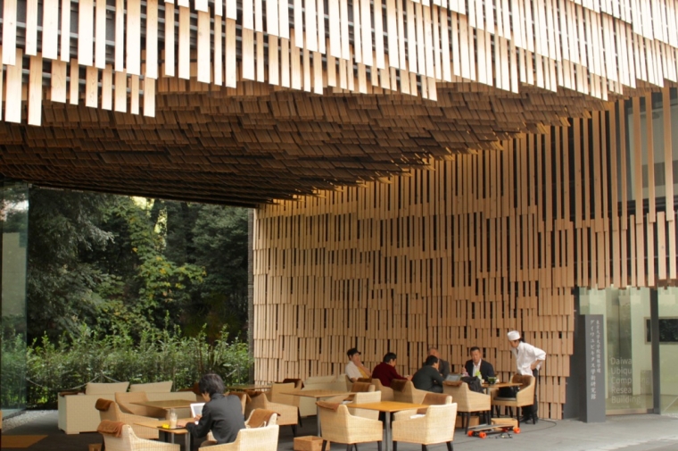 Seating area under stylish wood plank archway