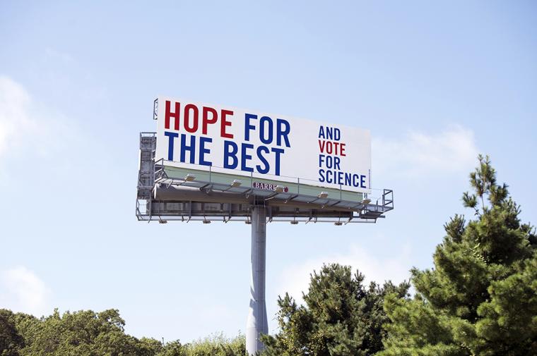 Billboard saying "Hope for the best and vote for science!"