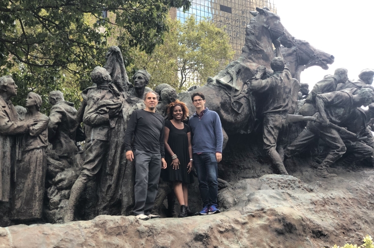 Paul Farber standing in front of sculpture with artist Manuel Acevedo