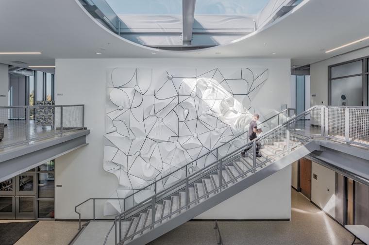 Relief wall seen from across the atrium