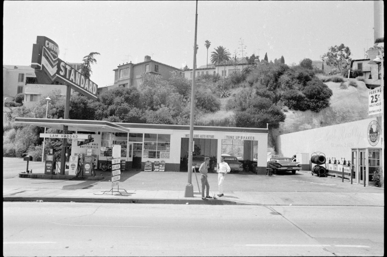 Black and white photo of Standard gas station