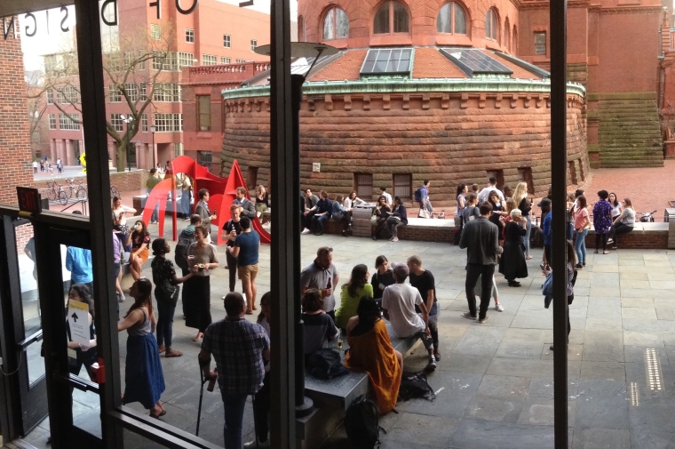 Happy Hour participants gathered on plaza at Meyerson Hall