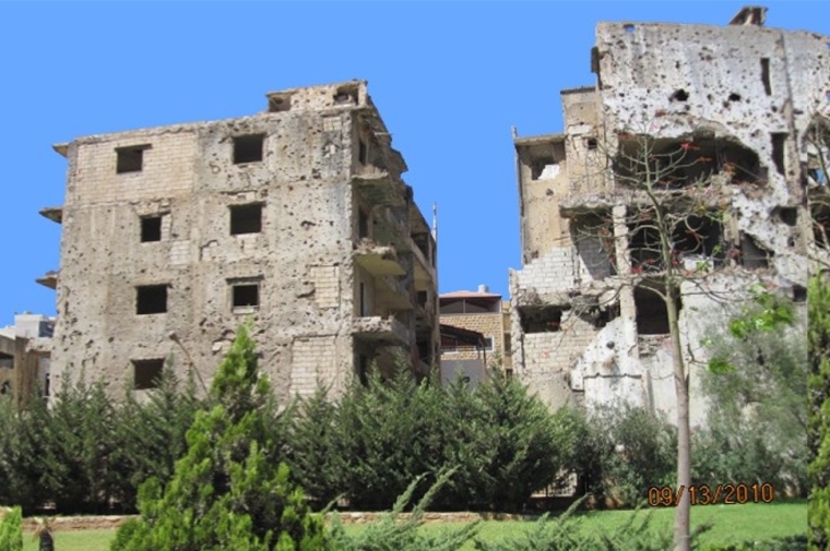 Photo of concrete buildings partially demolished