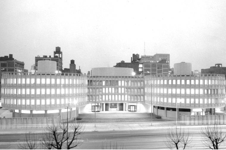 Black and White Photo of of concrete mid century 4 story building
