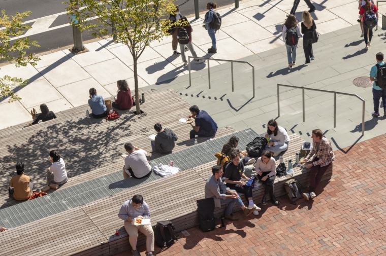 steps outside Meyerson Hall filled with students