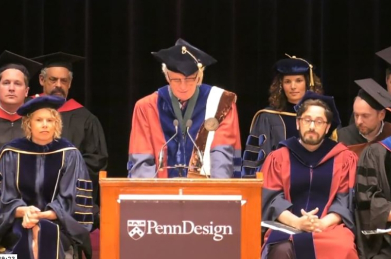 Faculty giving commencement address