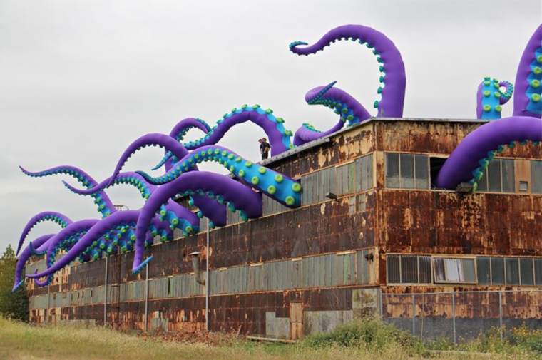 Installation involving giant cartoonish octopus tentacles