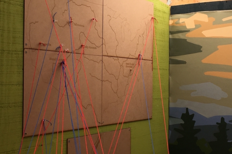 Map with strings from post-its indicating areas