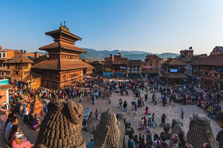 town square with brown stone asian architecture