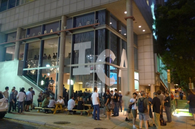 Front of the Institute of contemporary art during the evening with students gathered around.