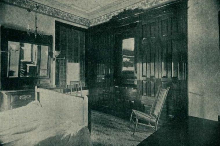 black and white photo of dining room interior