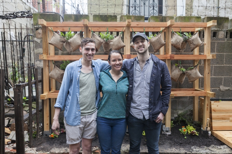 Students Doug Breuer, Allison Koll, and Clay Gruber (all MLA/MArch '18) complete installation of planting structure and bench for Southeast by Southeast in South Philadelphia. All materials were reclaimed from Revolution Recovery and repurposed for use by the community. Photo credit: Gordon Stillman.