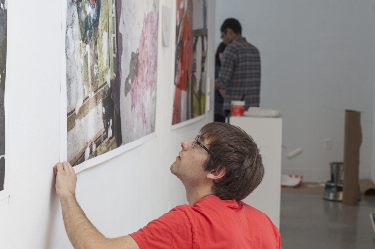 Sam Sherman works on his piece for the Thesis Show