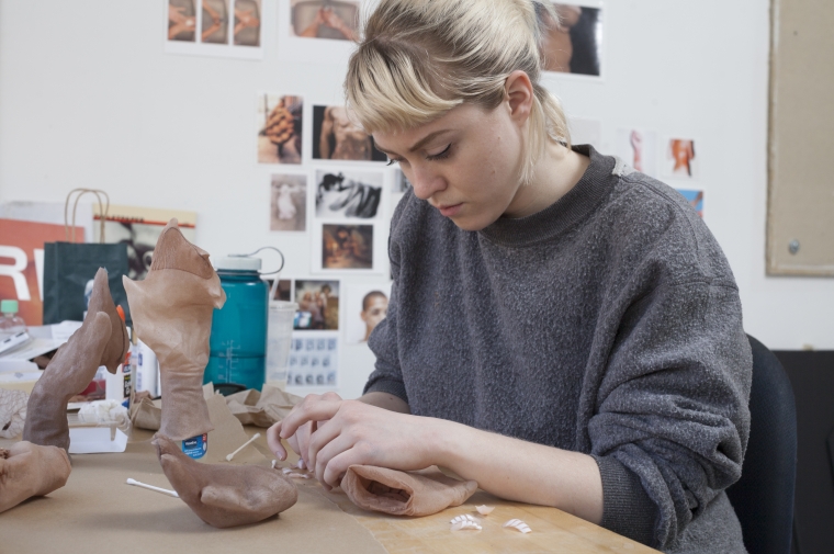 Liz Barr works on her piece for the Thesis Show