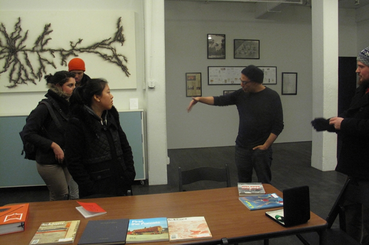 Students listening to Sina Najafi