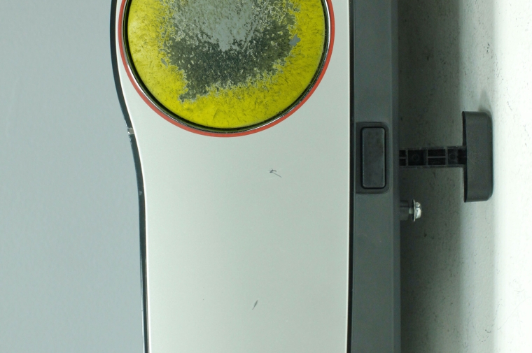 Image of the artist with installation made of varied materials