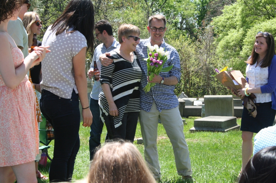 Randy Mason presents Suzanne Hyndman with flowers in honor of her retirement.