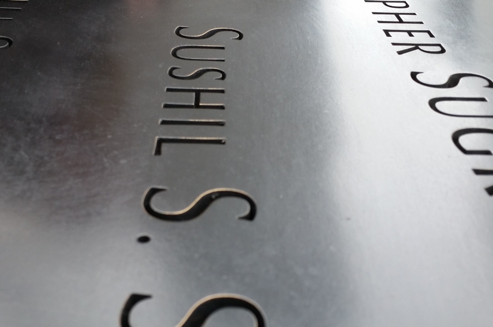 Names around the Memorial Fountain in New York.