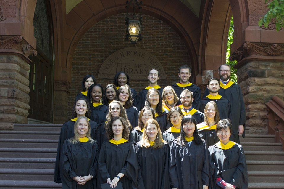 Historic Preservation graduates on the steps of the Fisher Fine Arts Library.