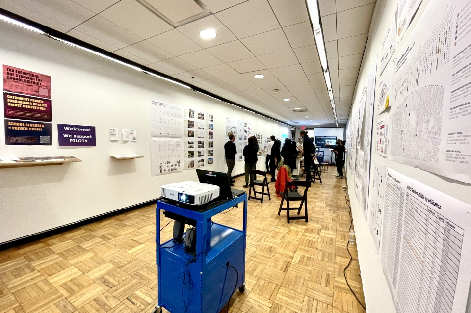 Students celebrating their presentations in Dean's Alley.