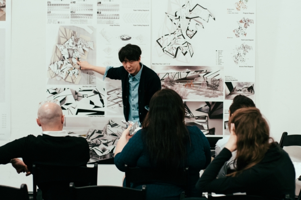 Student presenting work at spring final reviews