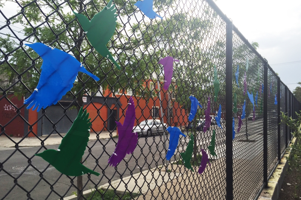 Bird designs on chain link fence at William Cramp Elementary School