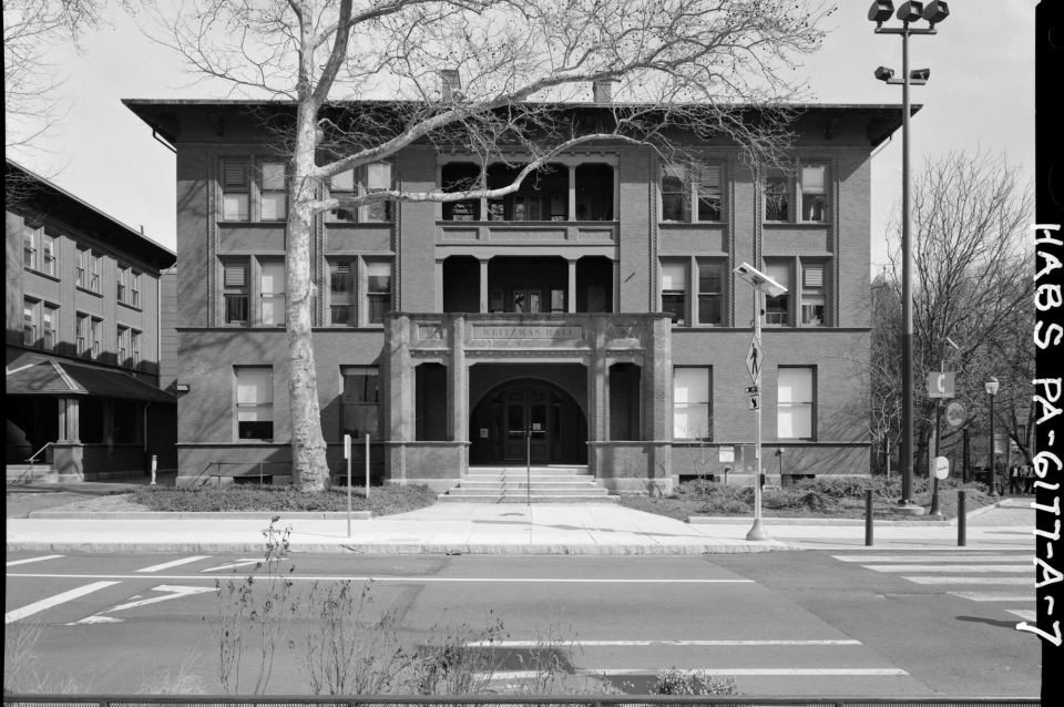 Black and white photo of 3-story Italianate facade