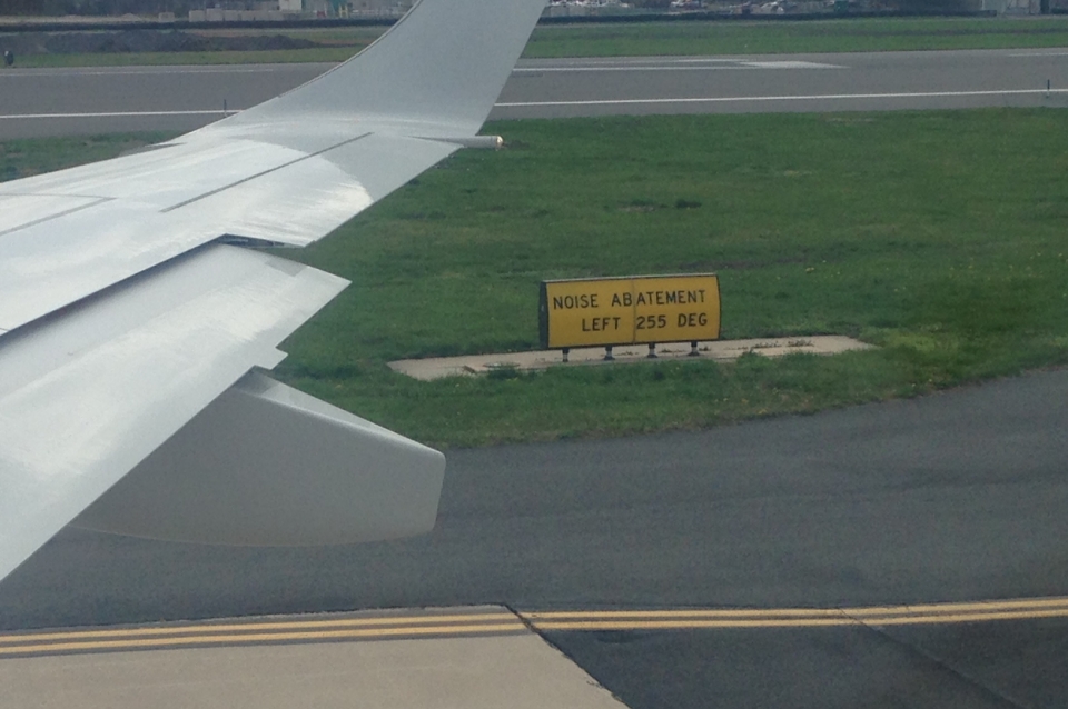 Wing of an airplane on the runway