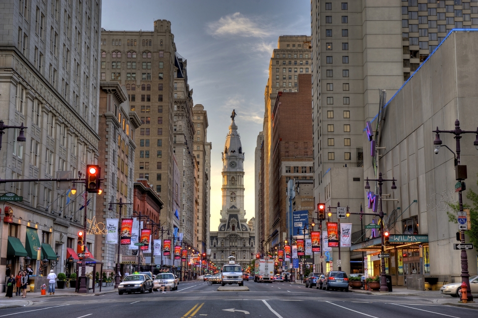 Market street view of city hall at sunset