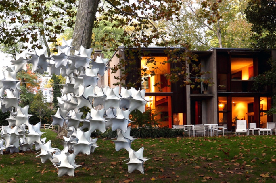 Award winning Penn Pavilion in front of modernist home.