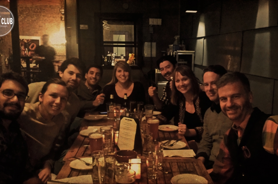 Group photo of dining club at restaurant 