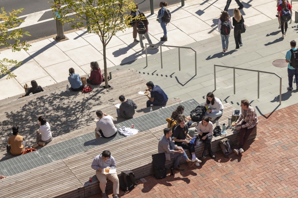 steps outside Meyerson Hall filled with students