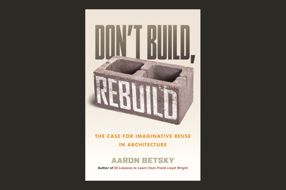 cover of "Don't Built: Rebuild" book with a cinder block 