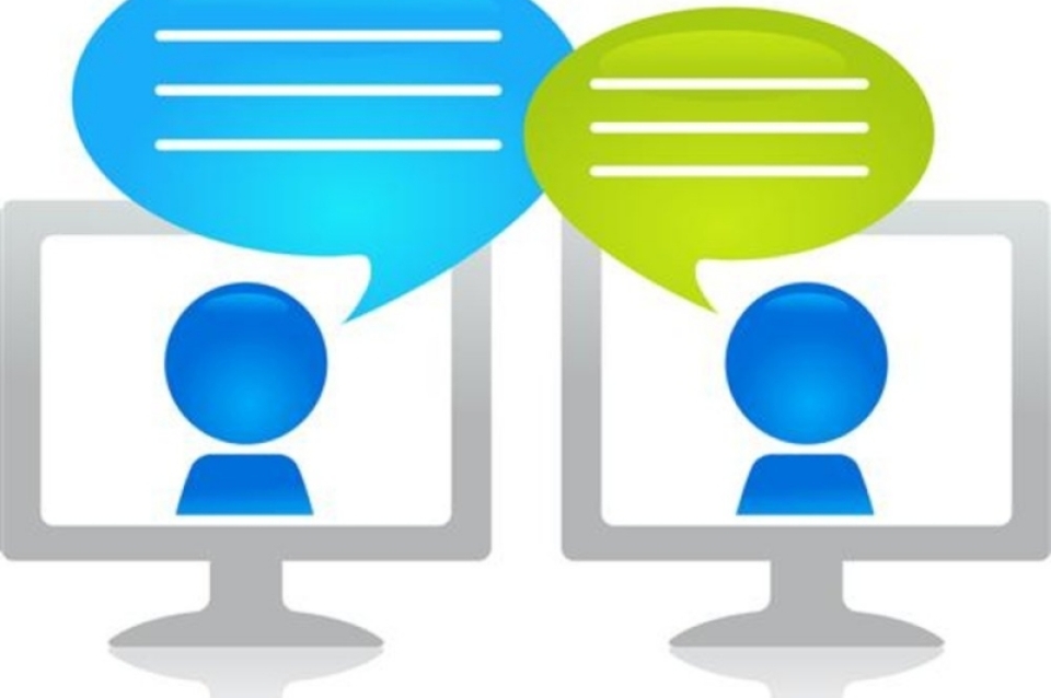 Two monitors with talking heads conversing with each other.