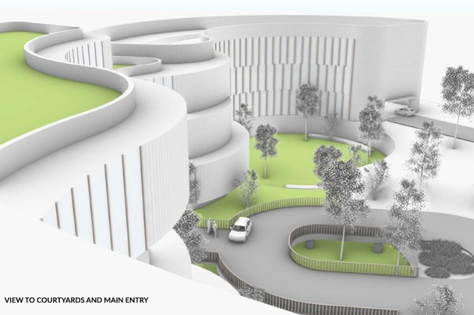 Students' design project for a new cancer treatment center with green space just outside the entrance as well as on the rooftop.