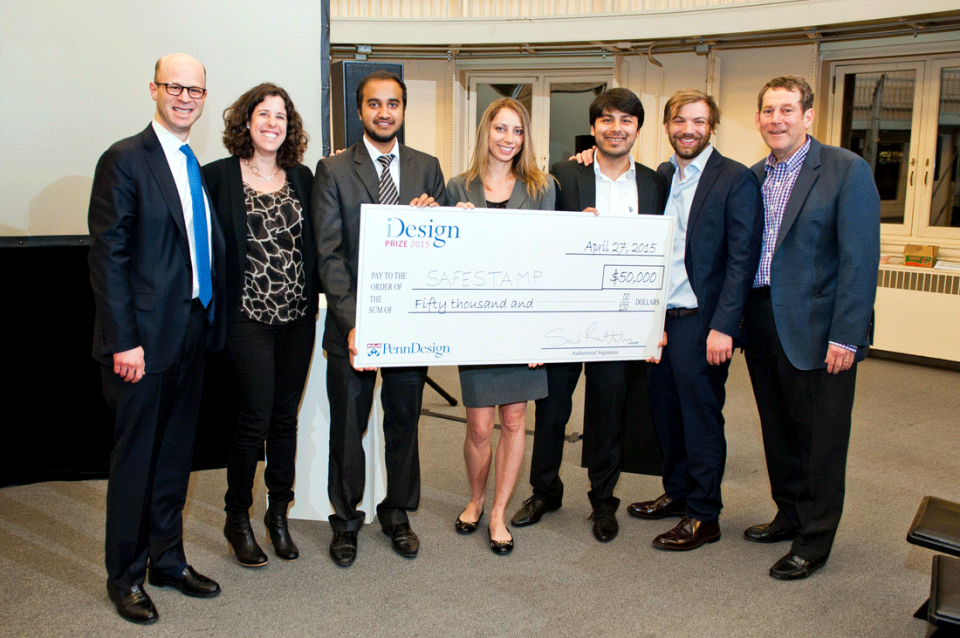 Team photo with novelty sized check