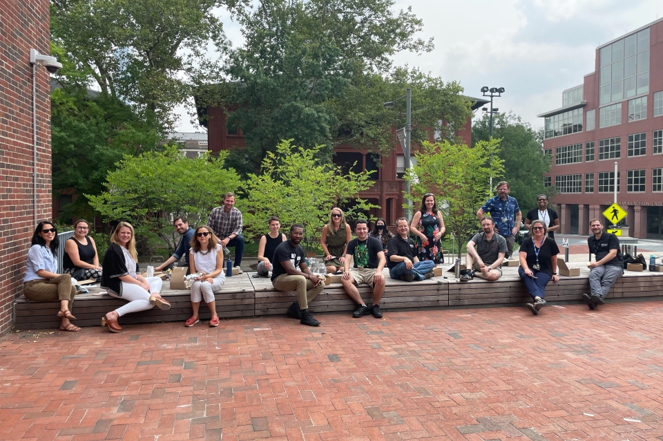 Weitzman staff enjoying lunch outside.