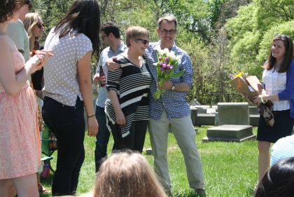 Randy Mason presents Suzanne Hyndman with flowers in honor of her retirement.