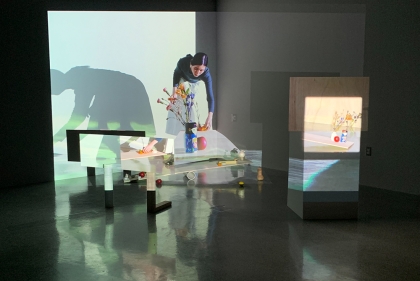 Installation view of artist performing