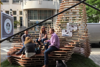 Students sitting on complex seating structure