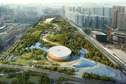 Aerial view of round stadium in a landscape of trees